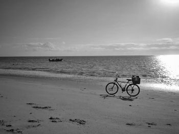 View of lone boat on calm beach