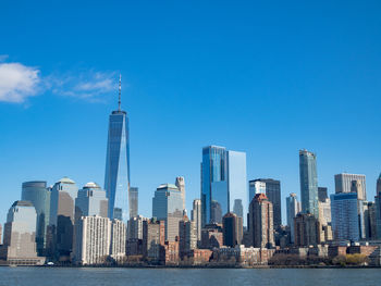 Modern buildings in city against sky