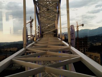View of bridge against cloudy sky