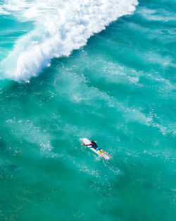 High angle view of people in sea