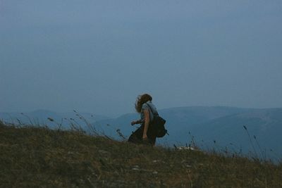 View of people standing on beach