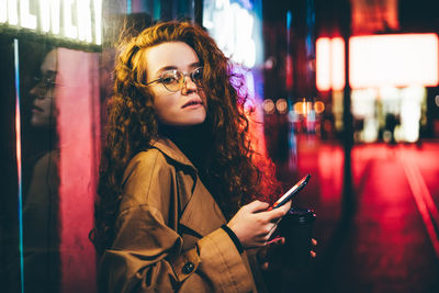 Young woman using mobile phone