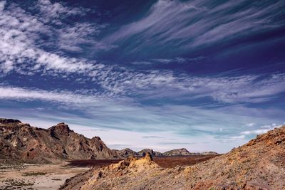 Scenic view of rocky mountains against sky