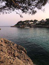 Scenic view of sea against sky at sunset