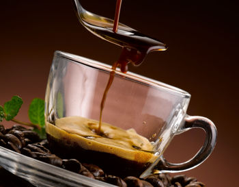 Close-up of coffee cup on table