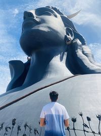 Low angle view of statue against sky