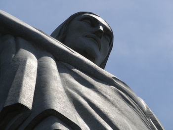 Low angle view of statue against sky