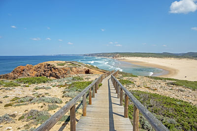 Boardwalk on beach at carrapateira beach in portugal