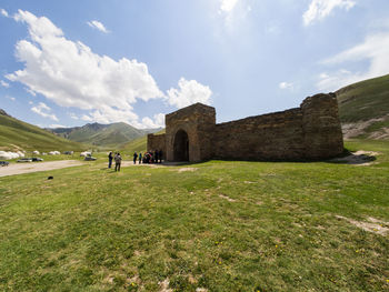 View of castle against cloudy sky