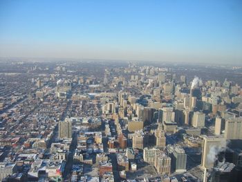 Aerial view of cityscape against clear sky