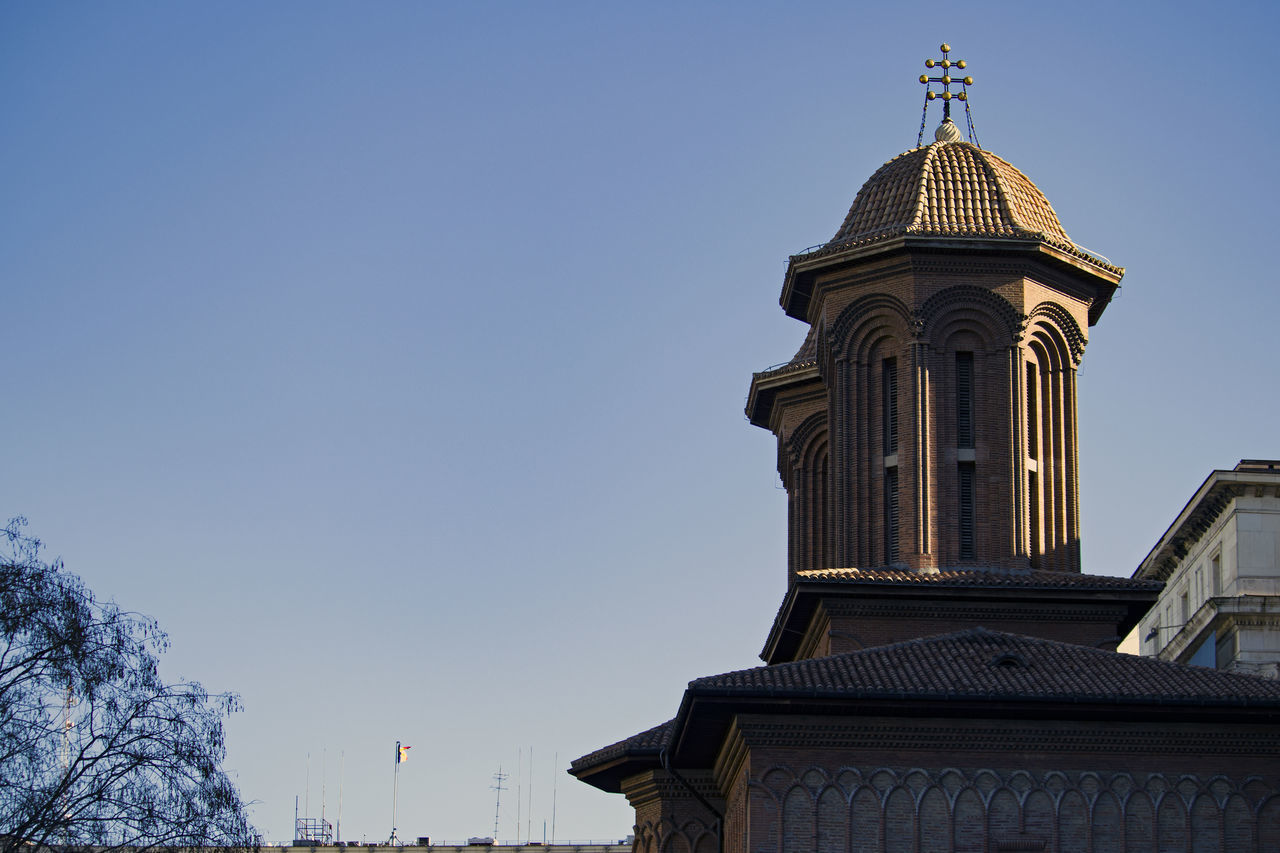 LOW ANGLE VIEW OF CHURCH AGAINST CLEAR BLUE SKY