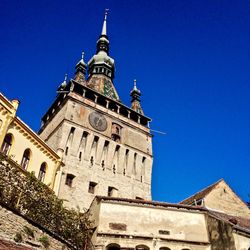 Low angle view of cathedral against blue sky