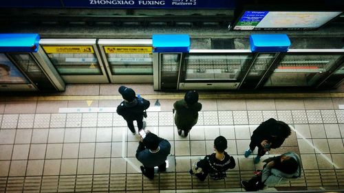 High angle view of people at subway station