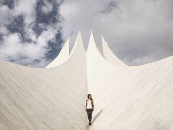 Close-up of woman standing against sky