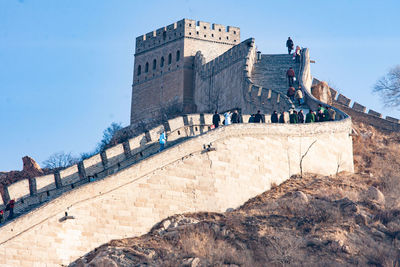 Low angle view of fort against blue sky