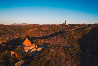 The temple on the mountain under the clear sky