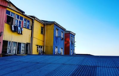 Buildings against blue sky and clouds