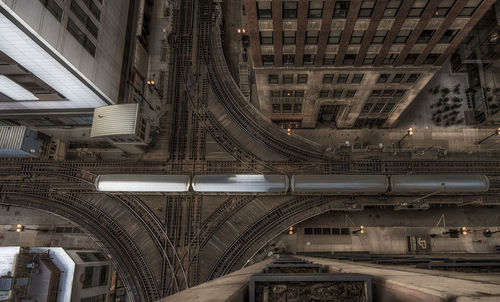 High angle view of elevated tracks along built structures