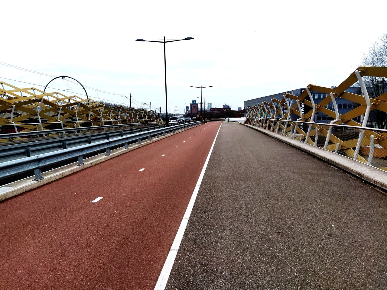 ROAD BY BRIDGE AGAINST SKY