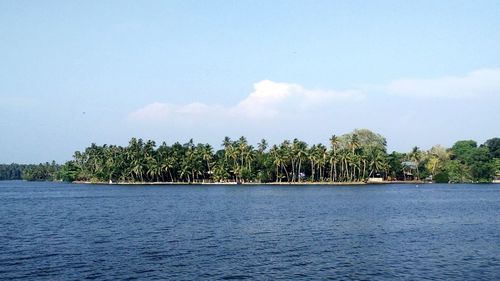 Scenic view of landscape against blue sky