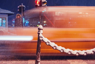 Blurred motion of vehicles on road at night