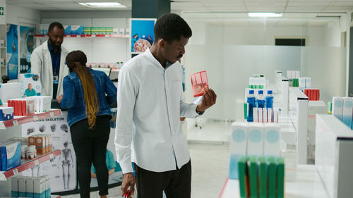 Portrait of doctor standing in laboratory