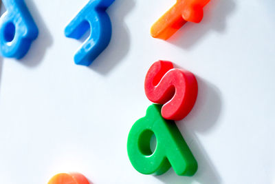 Close-up of toy over white background