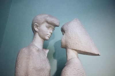 Close-up of statue against blue background