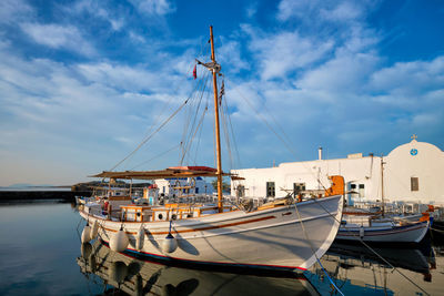 Boats moored at harbor