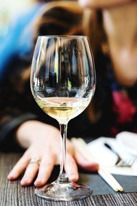 Close-up of wine glass on table