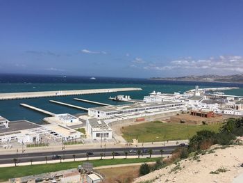 High angle view of road by sea against sky