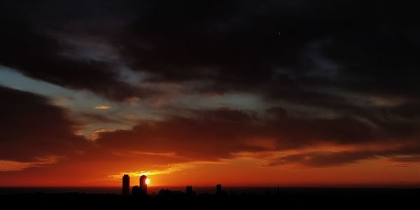 Silhouette of beach during sunset