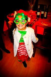 Portrait of multi colored umbrellas in front