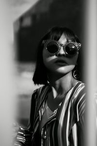 Portrait of woman wearing sunglasses