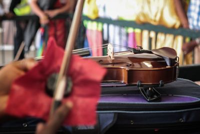 High angle view of violin on luggage