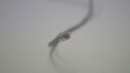 Close-up of cables against white background