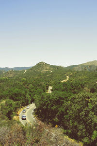 High angle view of road on mountain against clear sky