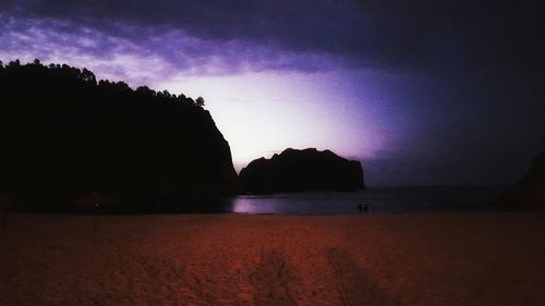 Scenic view of landscape against sky at sunset