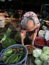 Woman selling vegetables