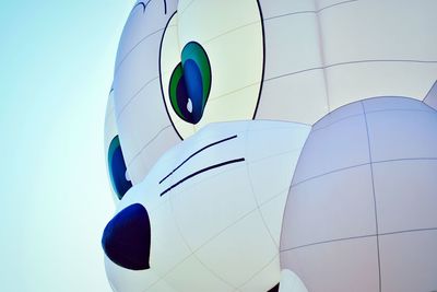 Low angle view of balloons against sky