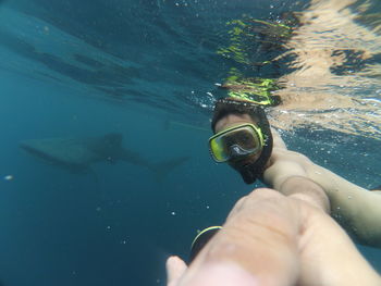 Man swimming in sea