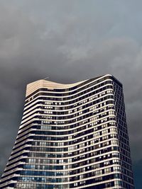 Low angle view of modern buildings against sky