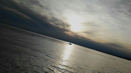 Scenic view of sea at sunset