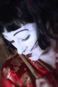 Close-up portrait of young woman