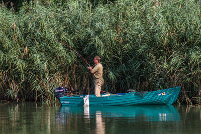 Man fishing in sea