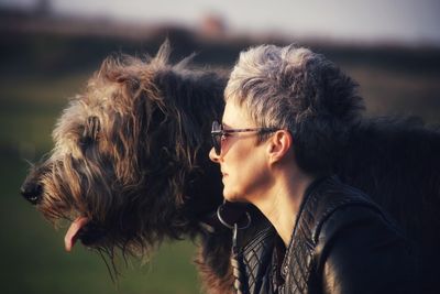 Close-up of woman with dog