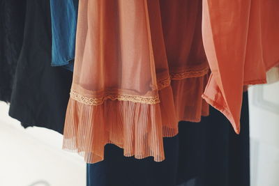 Close-up of clothes hanging at home