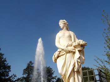 Low angle view of statue against clear sky