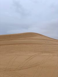 Scenic view of desert against sky