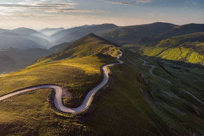 Summer aerial view of transalpina mountain road, at sunrise